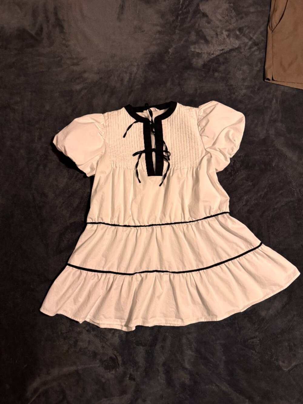Tiered White Mini Dress with Black Trim
